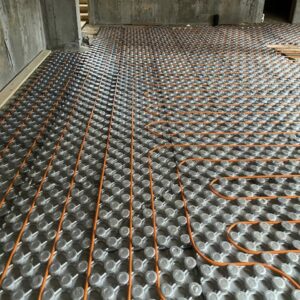 Underfloor heating installation in progress
