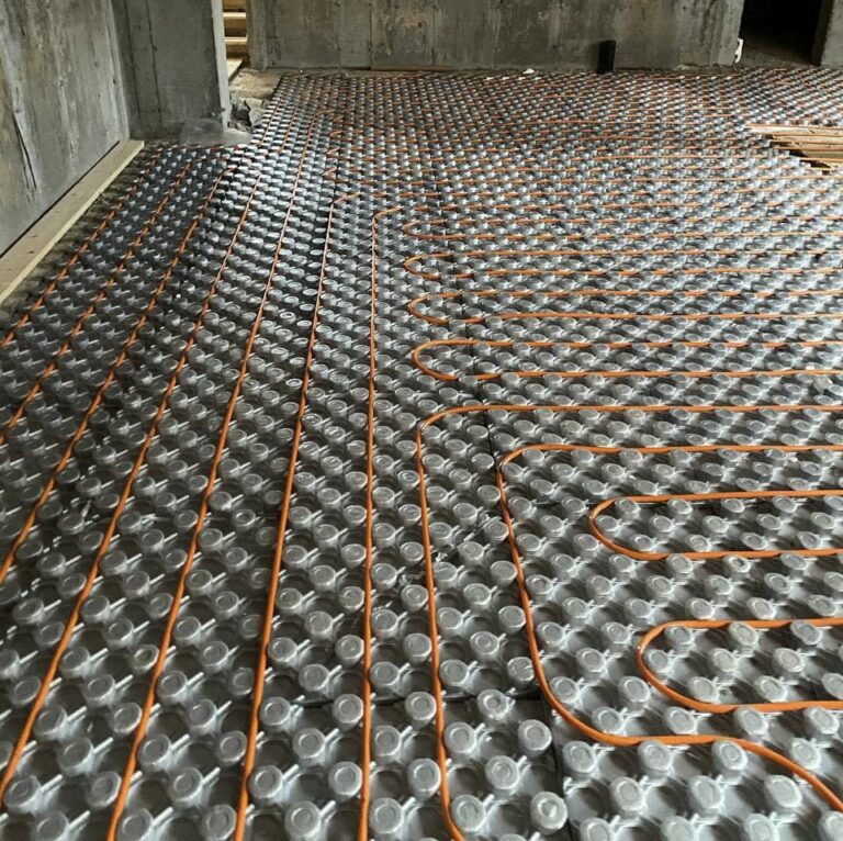 Underfloor heating installation in progress